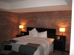 bed and brick wall