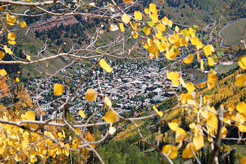 Telluride framed by yellow aspen leaves