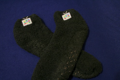 black slipper socks with Google TV logo