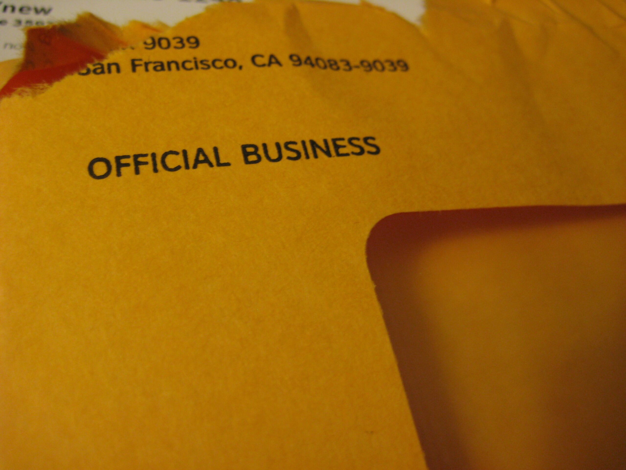 Envelope with "OFFICIAL BUSINESS" printed on it.