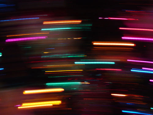 motion blur creating streaks of colorful lights