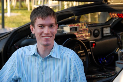 Michael Wyszomierski in front of a DeLorean