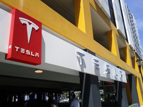Tesla sign on parking garage