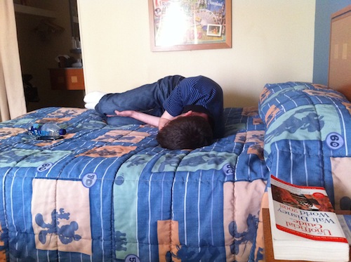 Wysz, exhausted and in pain on his bed