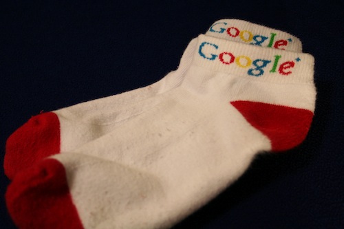 socks with Google logo and red toe and heel